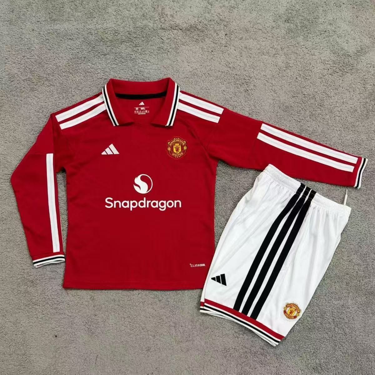 Manchester United Home Long Sleeve Kids Kit 26/27 front view